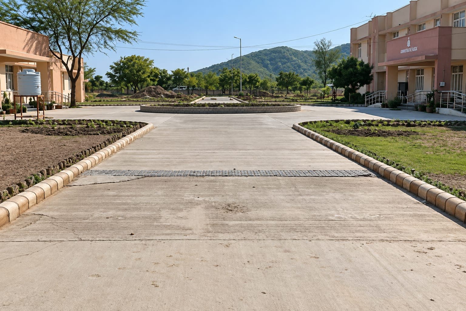 An approach road built in the external development of the Sashastra Seema Bal campus at Maujpur, Alwar, for NBCC